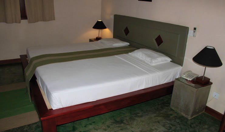 Kassapa Lion Rock Sri Lanka green bedroom minimalist decor