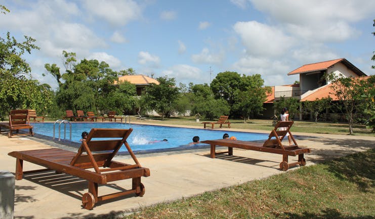 Kassapa Lion Rock Sri Lanka pool loungers wooden loungers outdoor 
