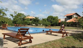 Kassapa Lion Rock Sri Lanka pool loungers wooden loungers outdoor 