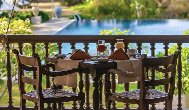 Ulagalla Resort dining terrace, outdoor dining area overlooking pool