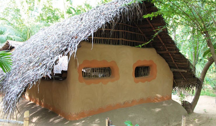 Ulpotha Sri Lanka bungalow traditional architecture wooden thatched roof