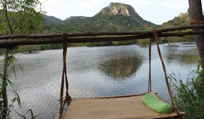 Ulpotha Sri Lanka lake view hammock next to lake mountain view