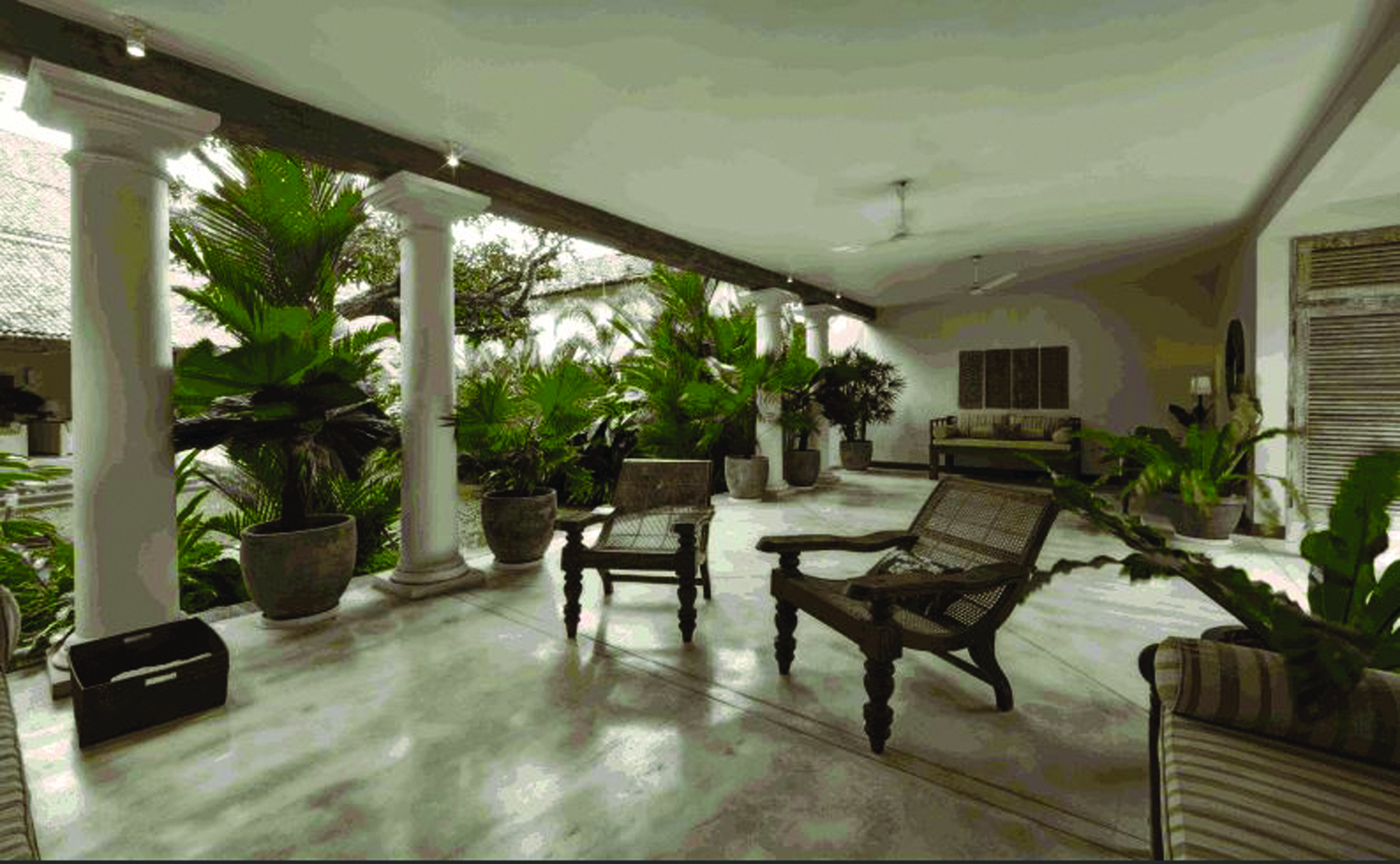 20 Middle Street Sri Lanka patio communal seating area chairs columns potted plants