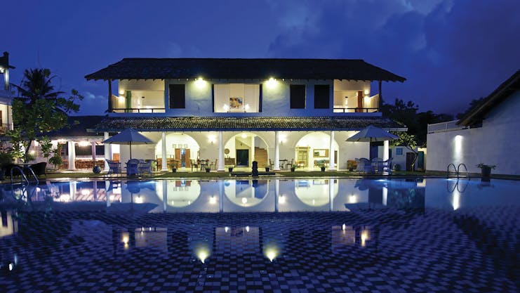 Amaloh by Jetwing Sri Lanka hotel exterior by night hotel lit up pool 