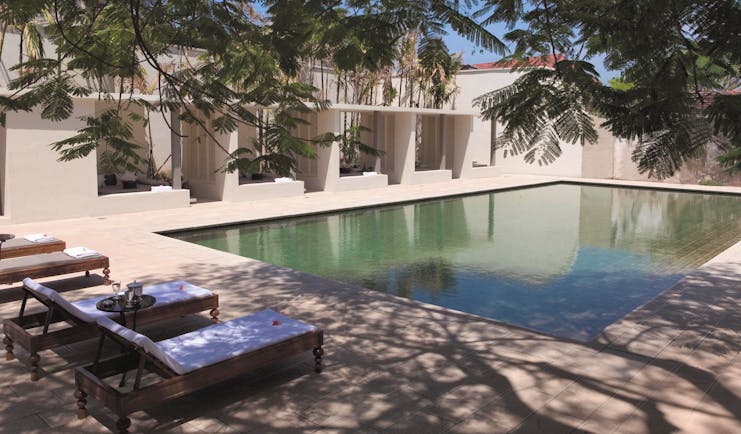 Amangalla  Sri Lanka outdoor pool sun loungers trees