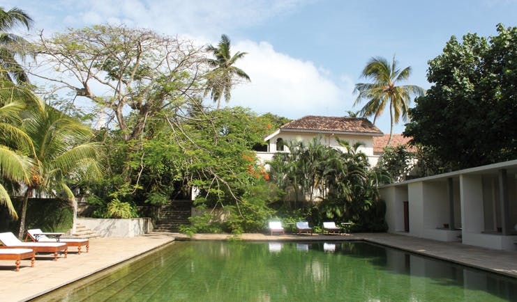 Amangalla  Sri Lanka swimming pool outdoor loungers trees