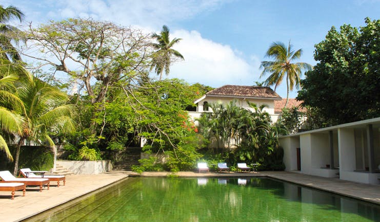 Amangalla  Sri Lanka swimming pool outdoor loungers trees