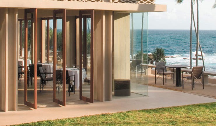 Amanwella Sri Lanka restaurant indoor and outdoor dining area ocean view