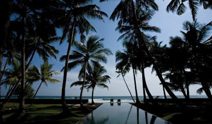 Apa Villa Thalpe Sri Lanka sea view infinity pool trees garden lounger