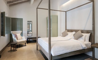 Fort Bazaar Sri Lanka bazaar bedroom four poster bed armchair elegant décor