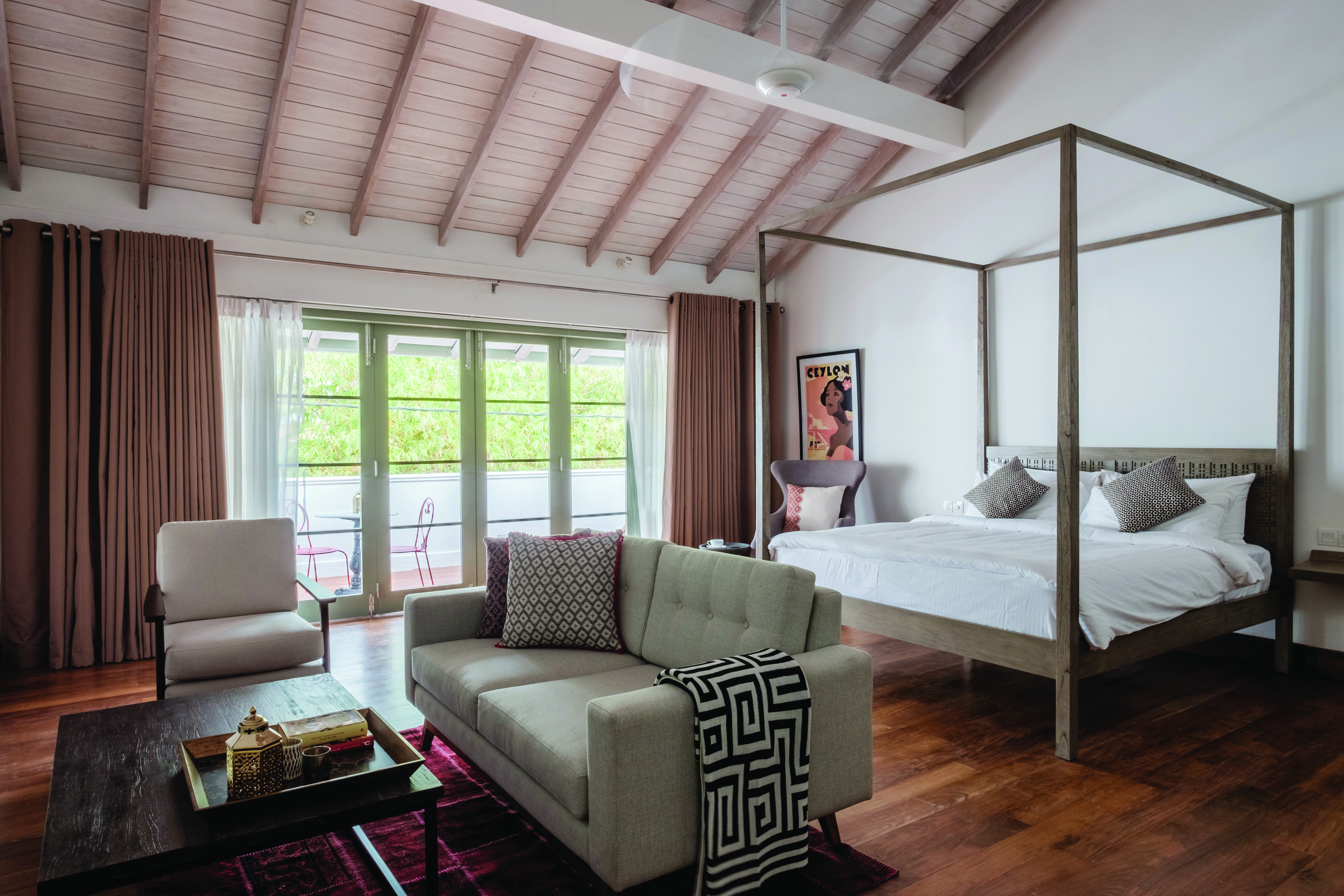 Fort Bazaar Sri Lanka upper suite four poster bed sofa armchair elegant décor