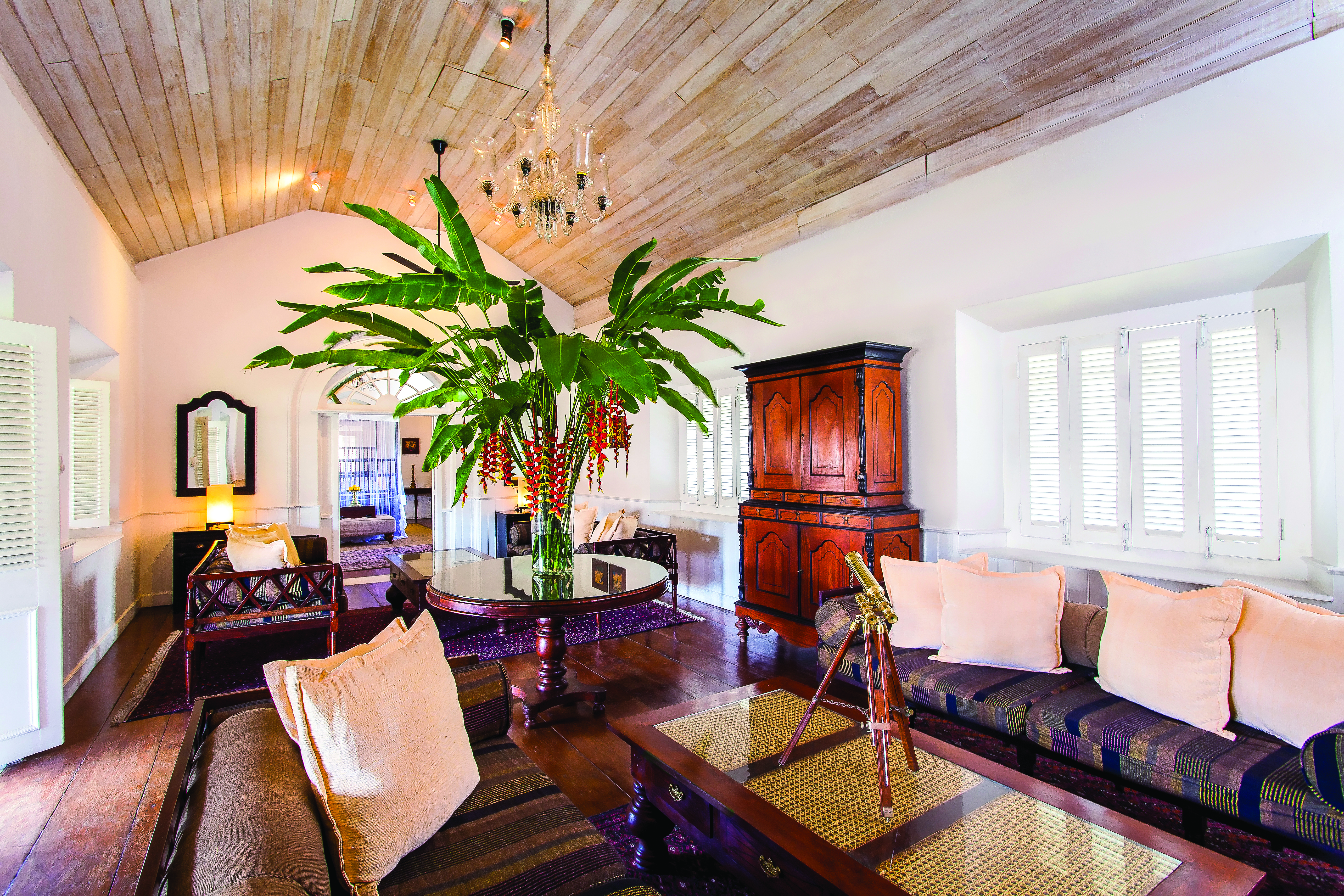 Galle Fort Hotel grand apartment lounge, sofa, glass table, elegant decor, antique furniture