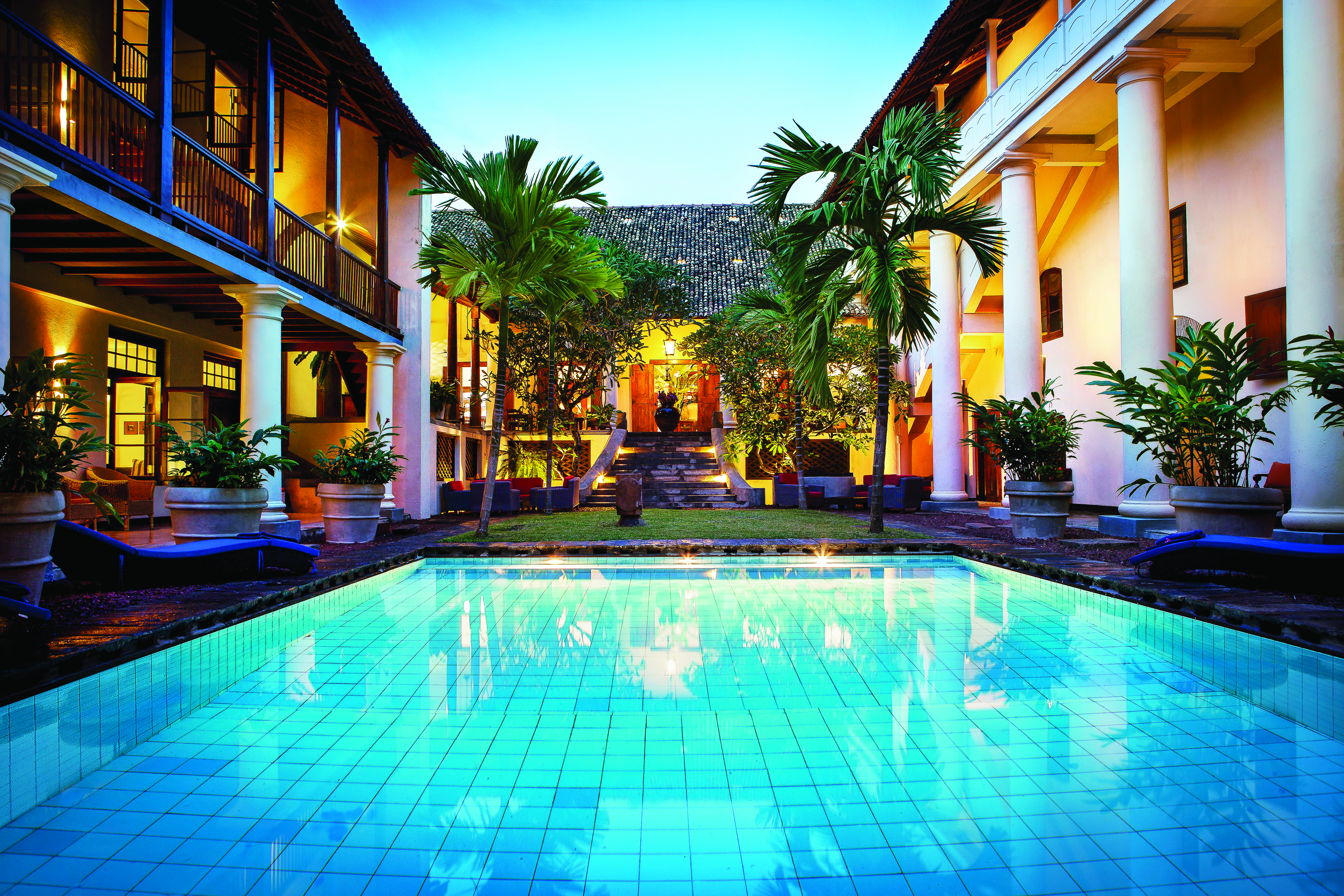 Galle Fort Hotel pool in hotel courtyard, columns, plants 