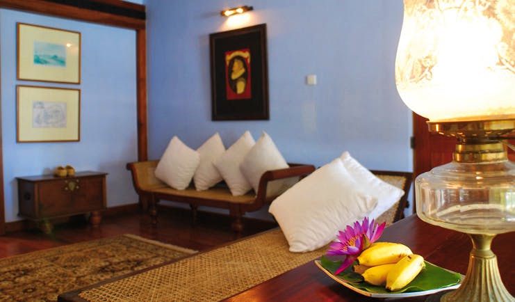 Jetwing Lighthouse Sri Lanka Spielbergen suite lounge with sofa and fruit bowl