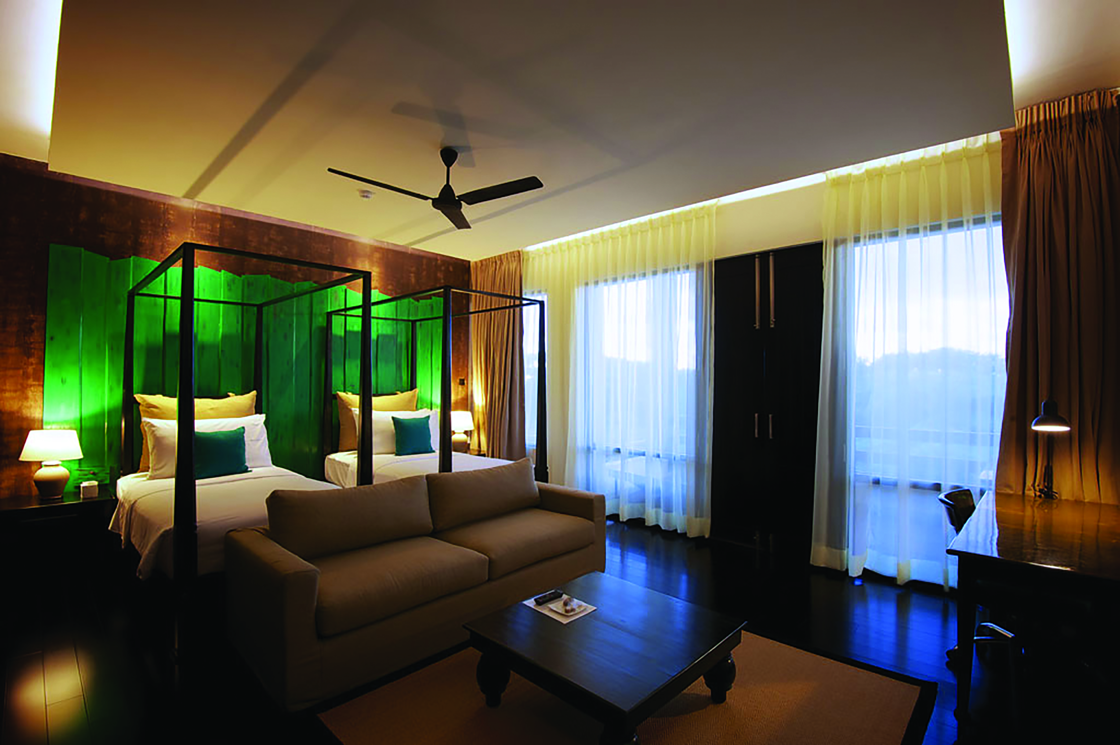 Jetwing Yala family room, twin beds, sofa, modern decor, colourful artwork