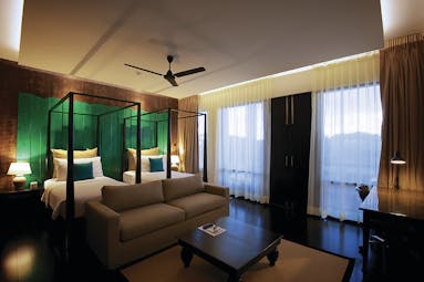 Jetwing Yala family room, twin beds, sofa, modern decor, colourful artwork