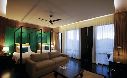 Jetwing Yala family room, twin beds, sofa, modern decor, colourful artwork