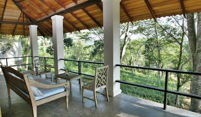 Kahanda Kanda Sri Lanka mango suite terrace with sofa and forest view
