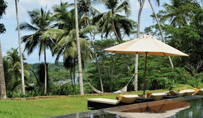 Kahanda Kanda Sri Lanka outdoor pool hammock sun loungers umbrellas 