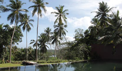 Kahanda Kanda Sri Lanka outdoor swimming pool sun loungers garden