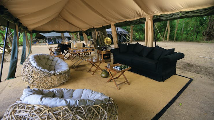 Leopard Trails lounge tent with sofa, bean bag chairs