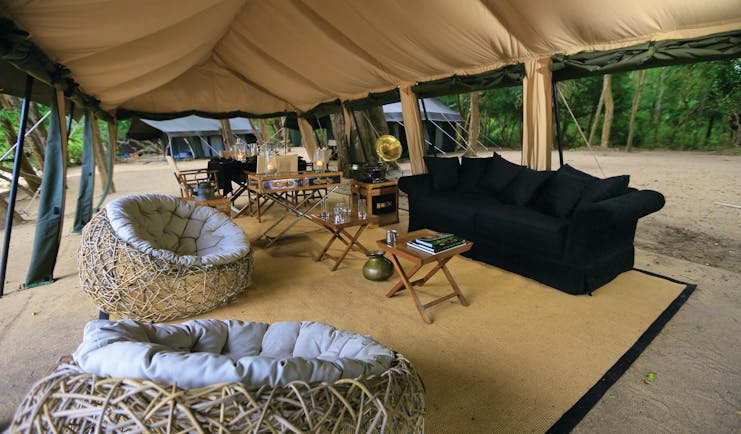 Leopard Trails lounge tent with sofa, bean bag chairs