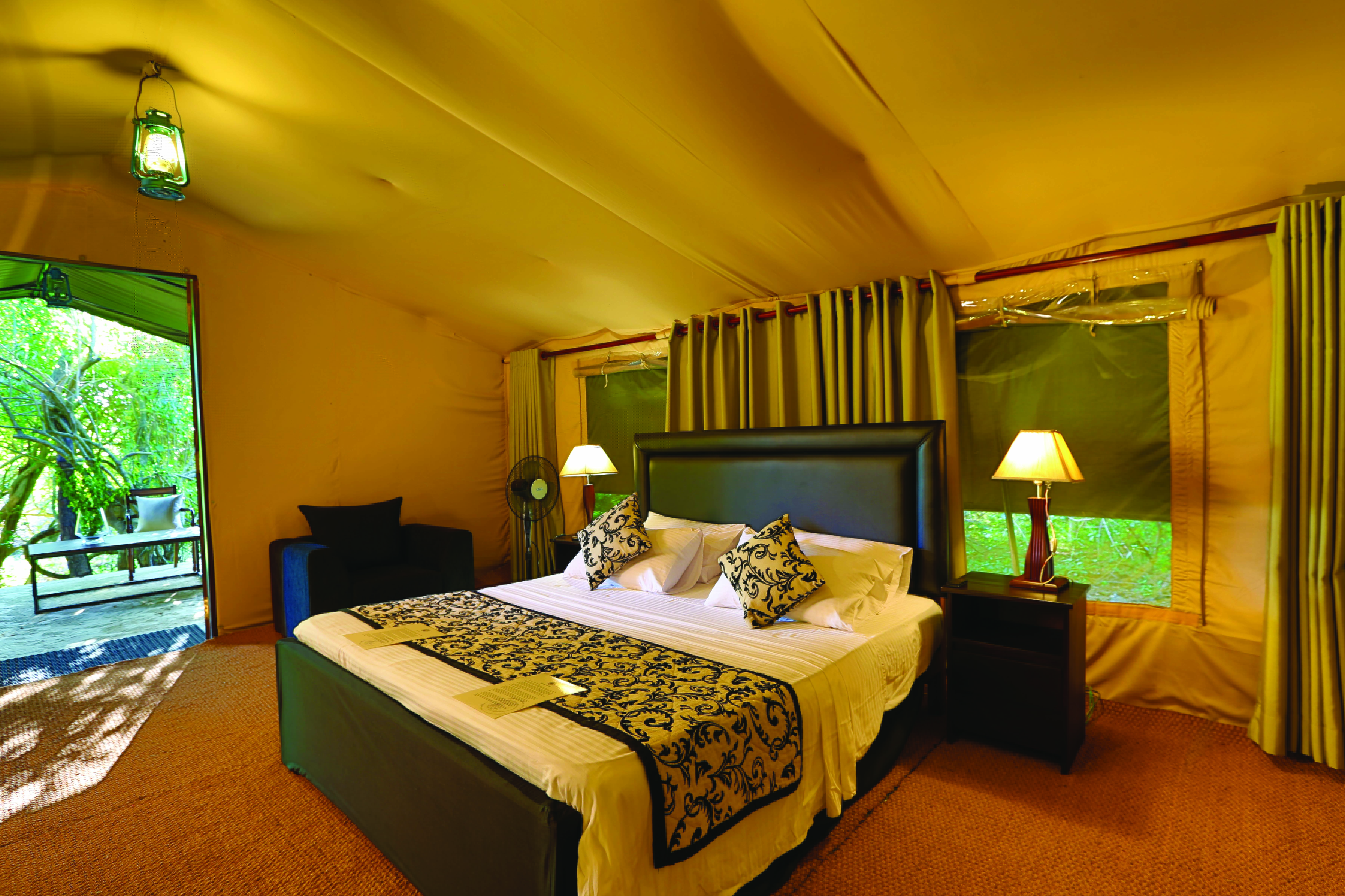 Leopard Trails luxury tent bed armchair outdoor seating