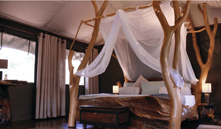 Noel Rodrigos Leopard Safari Sri Lanka tent interior bedstead made from tree