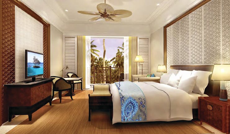Shangri La Hambantota Sri Lanka guest room bed sofa television bright modern décor