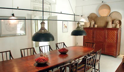 The Sun House Sri Lanka dining room long dining table bowls of chillis 