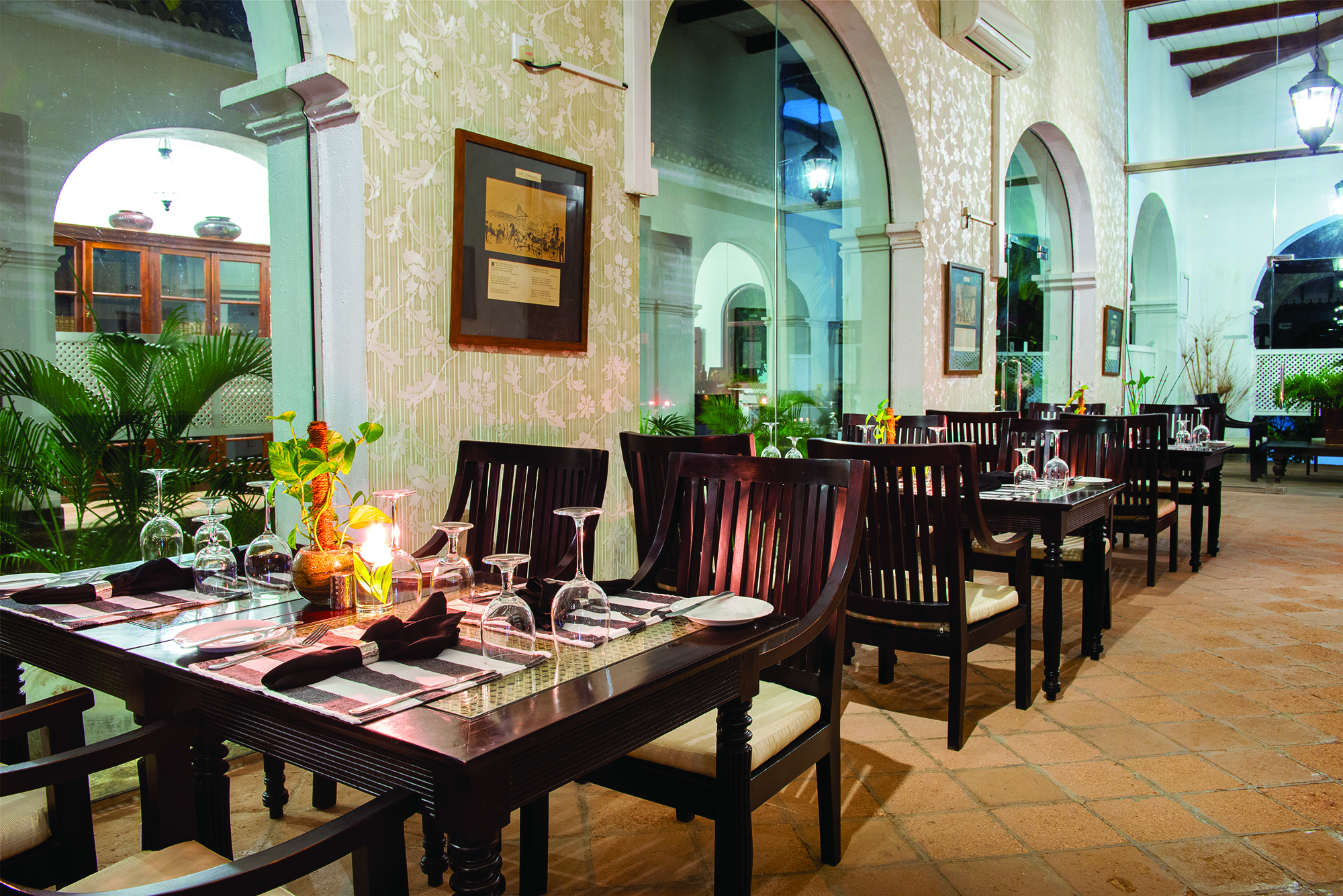 Tamarind Hill Sri Lanka indoor dining area tables chairs traditional décor