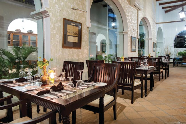 Tamarind Hill Sri Lanka indoor dining area tables chairs traditional décor