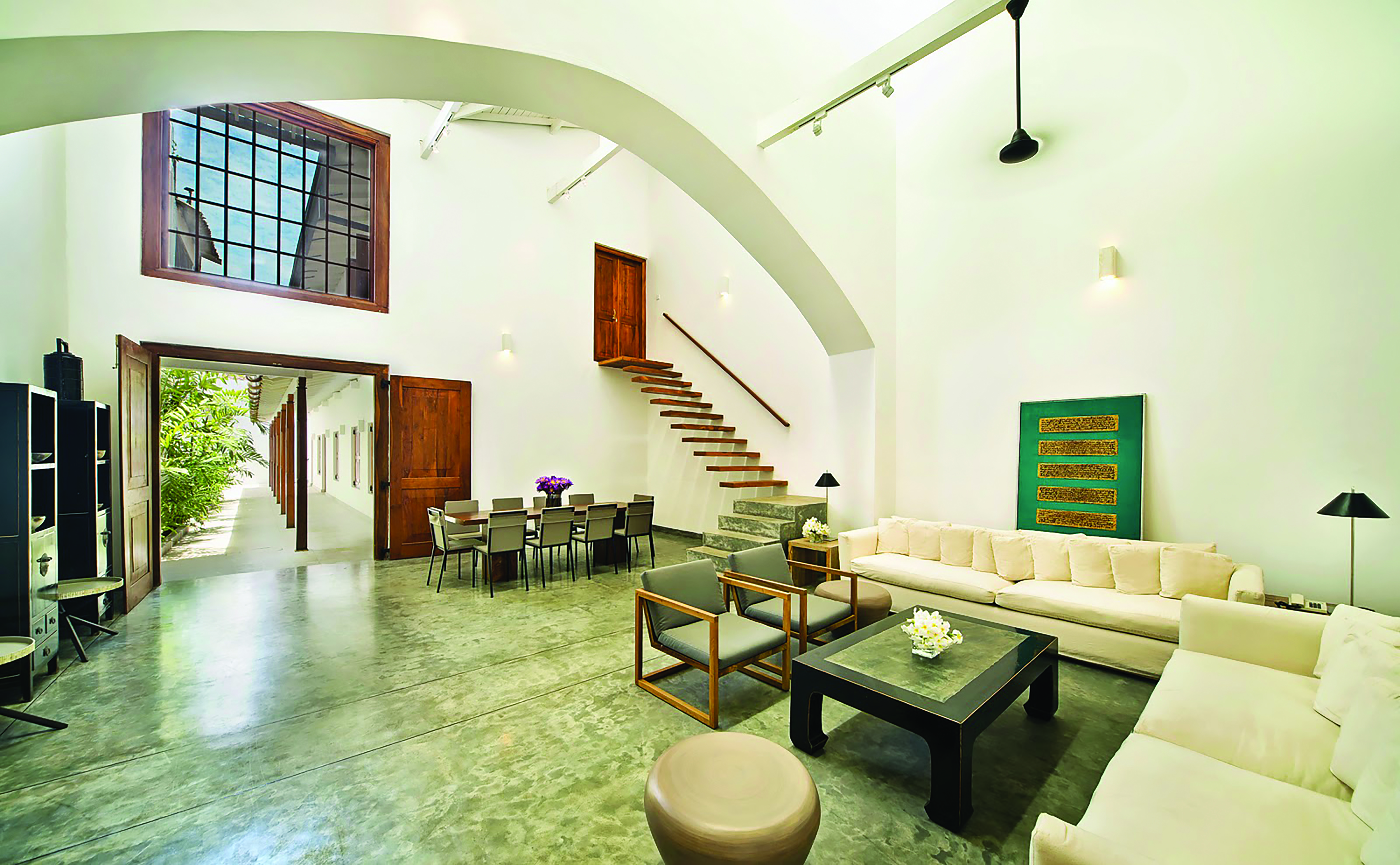 The Fort Printers new wing lobby, bright modern space with white sofas and wooden accents