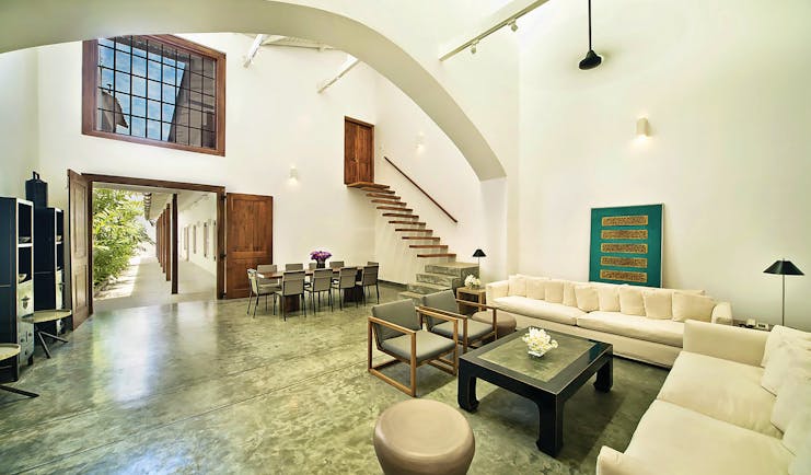 The Fort Printers new wing lobby, bright modern space with white sofas and wooden accents