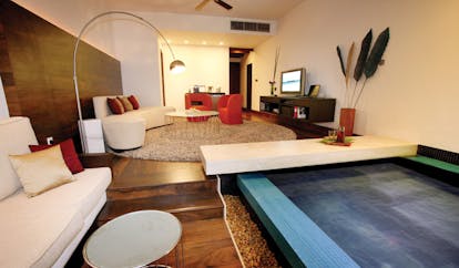 The Fortress Sri Lanka ocean loft living area with sofas dining area and plunge pool