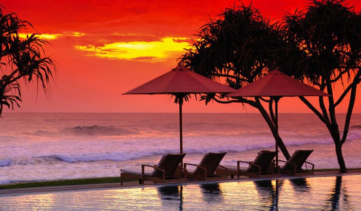 The Fortress Sri Lanka sunset beach loungers facing the ocean