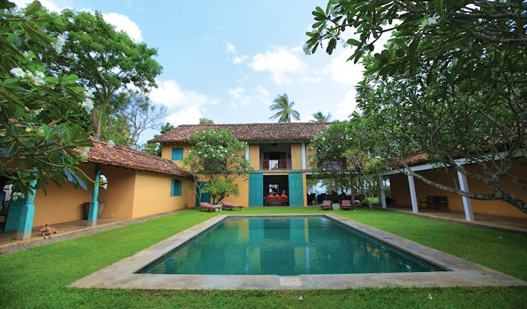The Last House Sri Lanka pool lawns sun loungers trees hotel building