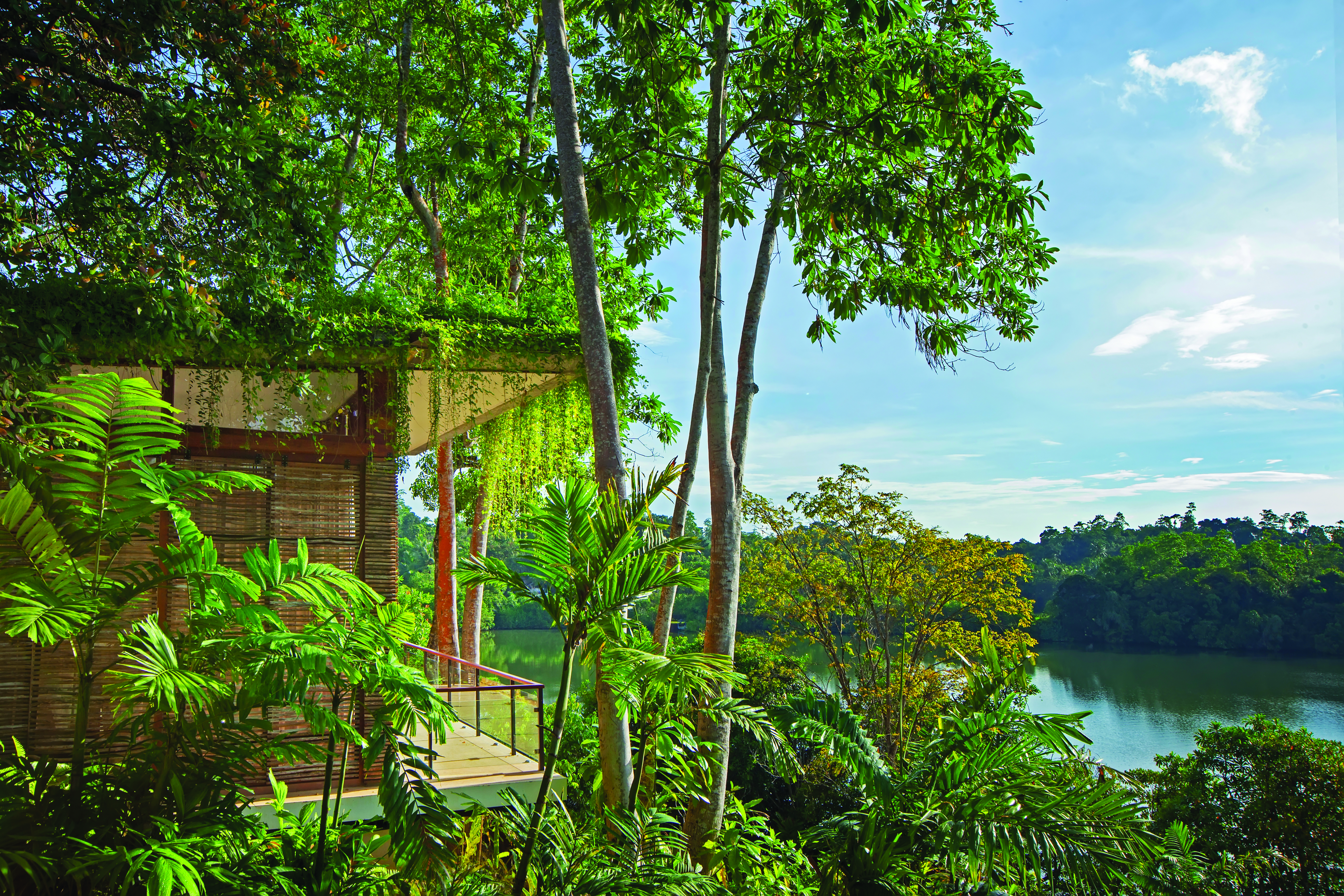 Tri Lanka Sri Lanka lake villa exterior building balcony trees views of lake