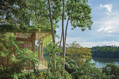 Tri Lanka Sri Lanka lake villa exterior building balcony trees views of lake