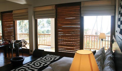 Weligama Bay Resort Sri Lanka junior suite balcony bedroom with large windows to balcony