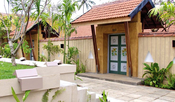 Ayurveda Pavilions Sri Lanka hotel exterior fence painted gates bamboos