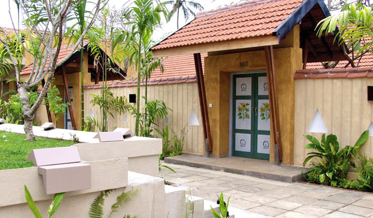 Ayurveda Pavilions Sri Lanka hotel exterior fence painted gates bamboos