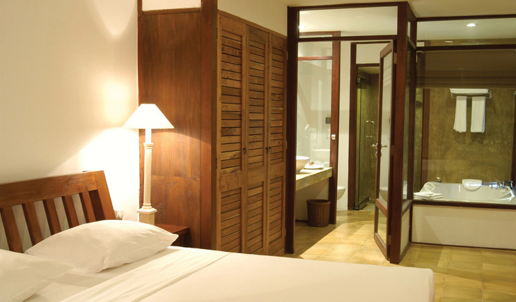 Jetwing Beach Sri Lanka suite white bed windows to bathroom and large bath