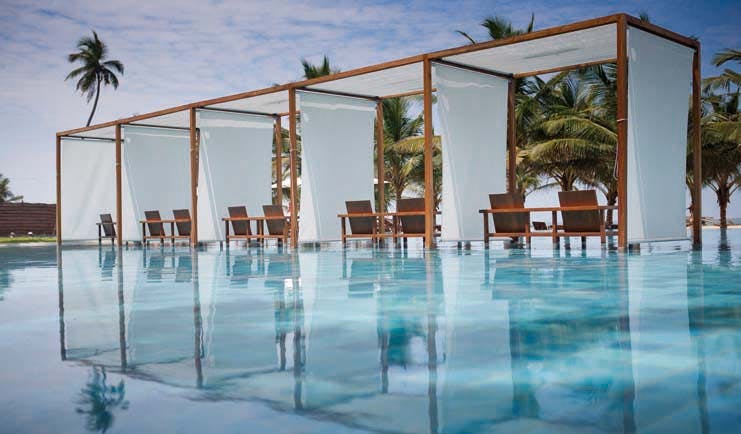 Jetwing Blue Sri Lanka pool loungers luxurious loungers in pool