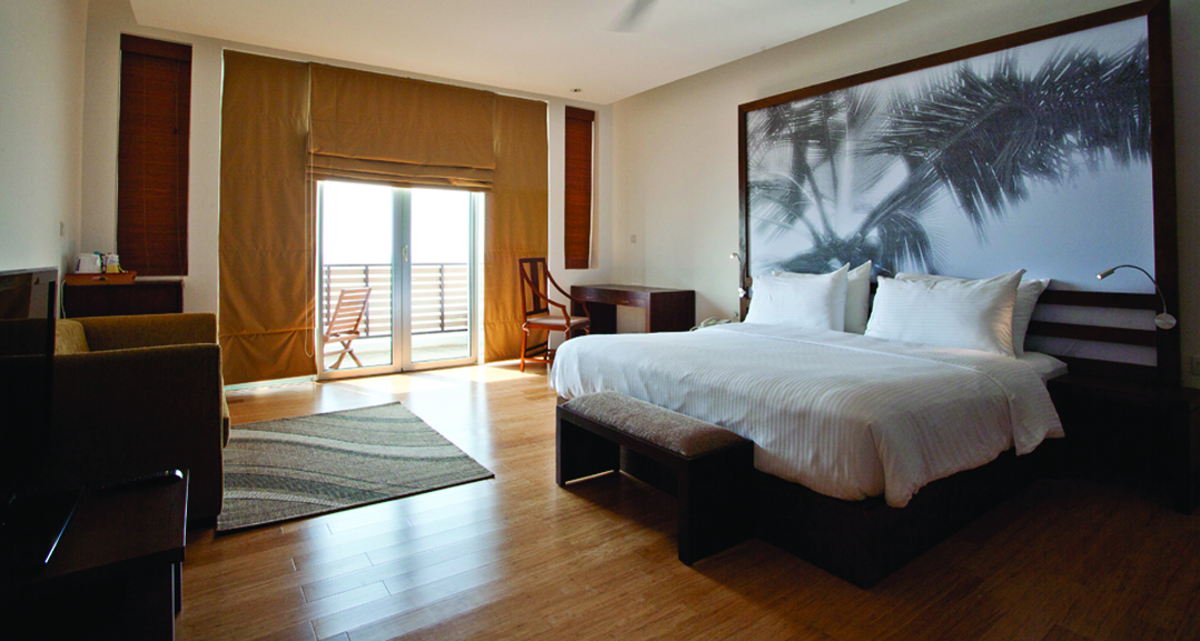 Jetwing Sea Sri Lanka deluxe room bed sofa private terrace modern décor