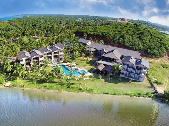 Aramanthe Bay Sri Lanka aerial hotel buildings pool gardens forest background