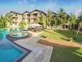Aramanthe Bay Sri Lanka exterior hotel buildings palm trees lawns pool