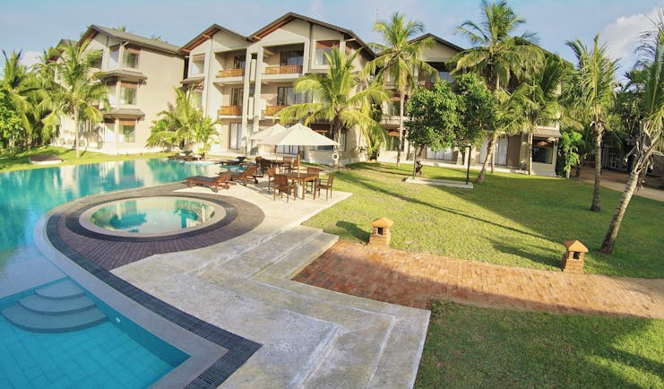 Aramanthe Bay Sri Lanka exterior hotel buildings palm trees lawns pool