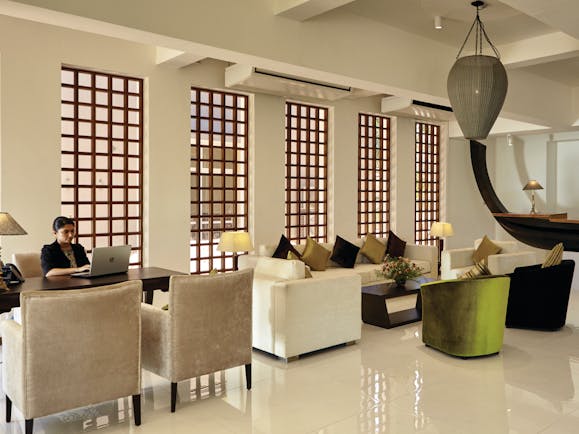 Aramanthe Bay Sri Lanka lounge indoor communal seating area sofas chairs modern décor