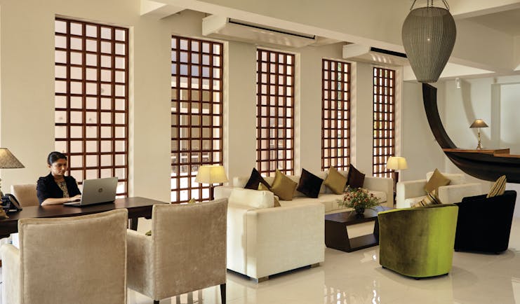 Aramanthe Bay Sri Lanka lounge indoor communal seating area sofas chairs modern décor